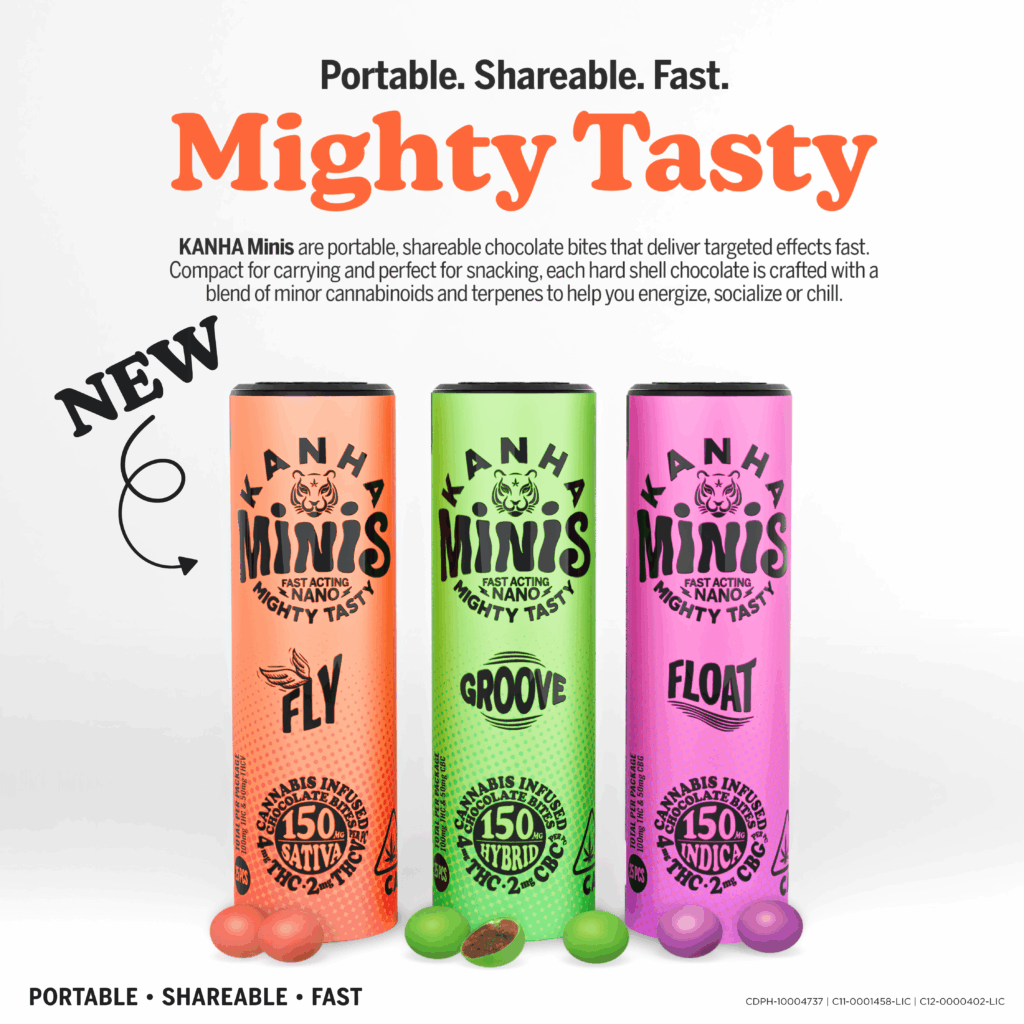 Three colorful cylindrical candy containers, labeled